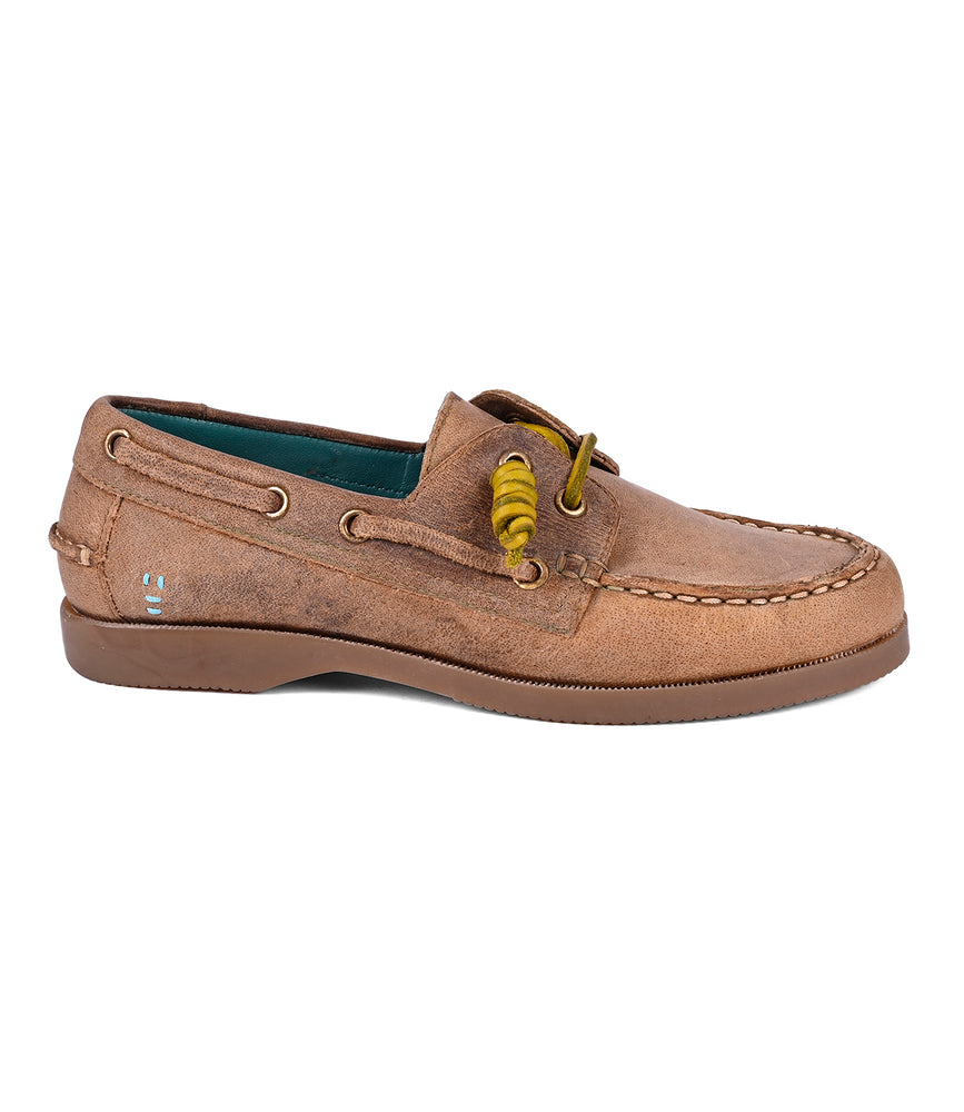 
                  
                    The Roan Abide women's leather boat shoe has a brown exterior, yellow laces, and white stitching. It is water-repellent and features a durable rubber sole, making it ideal for adventures on or off the deck.
                  
                