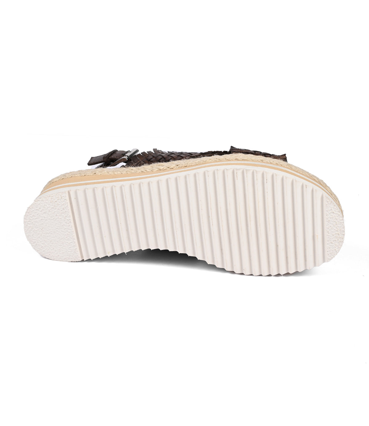 
                  
                    The Roan "Into" platform sandal features a ribbed, white foam outsole and a brown upper showcasing artisanal craftsmanship.
                  
                