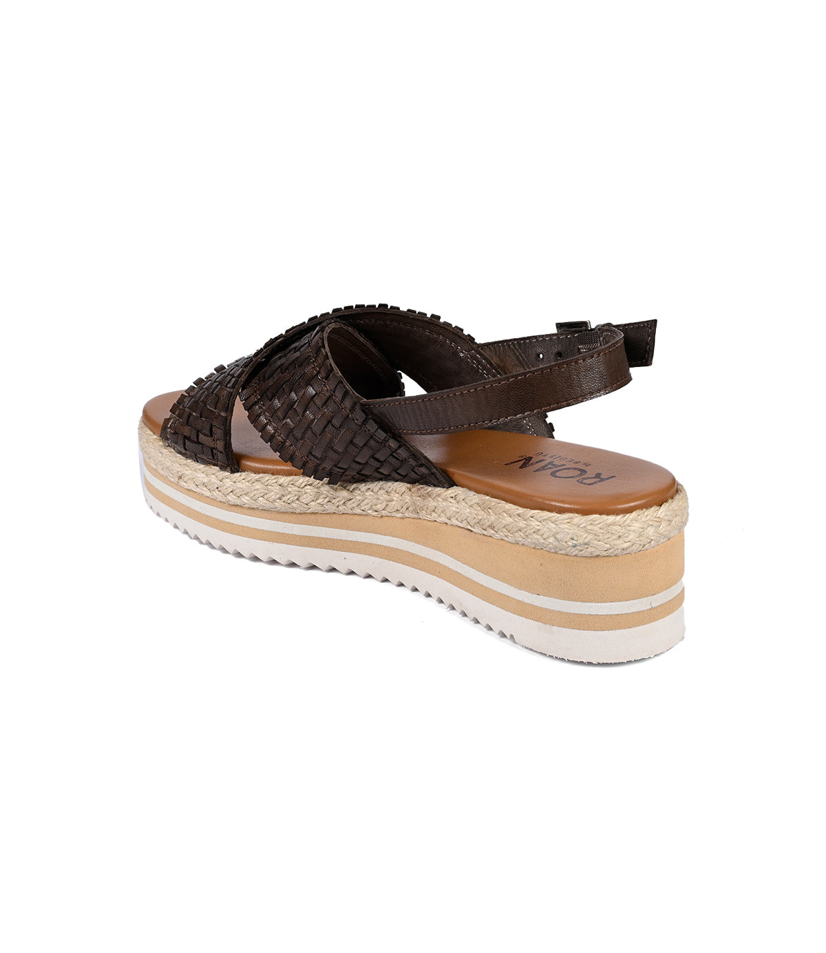 
                  
                    The Roan "Into" is a brown woven platform sandal with artisanal craftsmanship, featuring a cushioned footbed and lightweight serrated foam outsole for comfort, finished with an elegant ankle strap.
                  
                