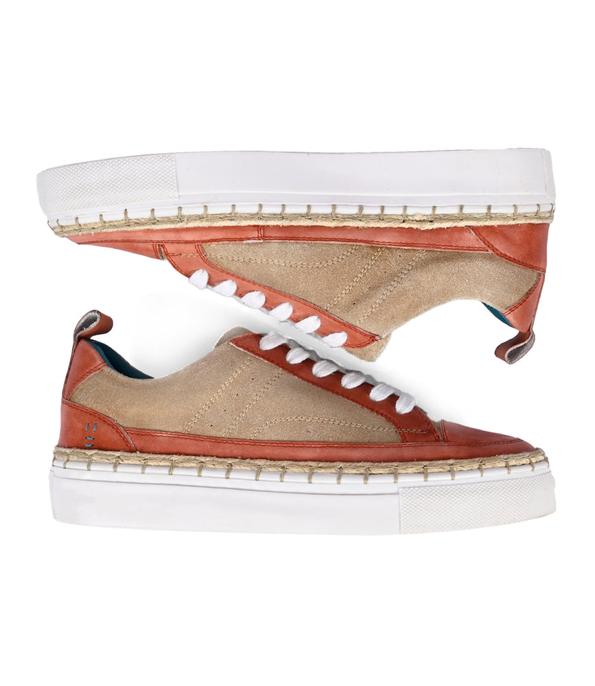 
                  
                    Beige and orange Roan Void lace-up sneakers with cushioned insoles and white soles, displayed in opposite directions on a plain white background.
                  
                