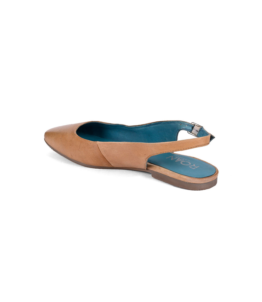 
                  
                    The Roan Woken is a tan slingback flat shoe with a pointed toe, versatile leather upper, blue inner lining, and a small heel.
                  
                