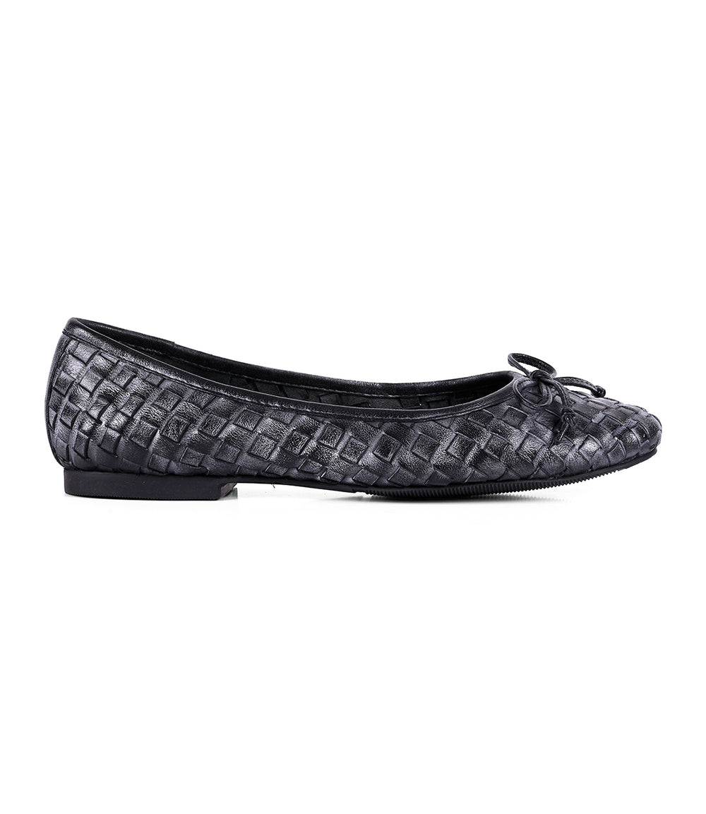 A single black flat slip-on ballerina shoe from Roan's 