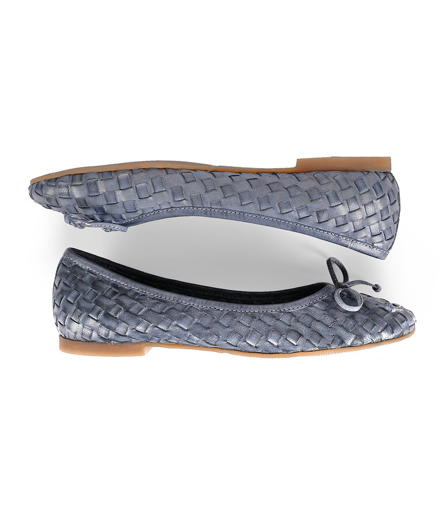 
                  
                    A pair of blue Roan Business slip-on ballerina shoes with bow detailing on top, meticulously showcasing intentional craftsmanship, shown from the top and side views against a white background.
                  
                