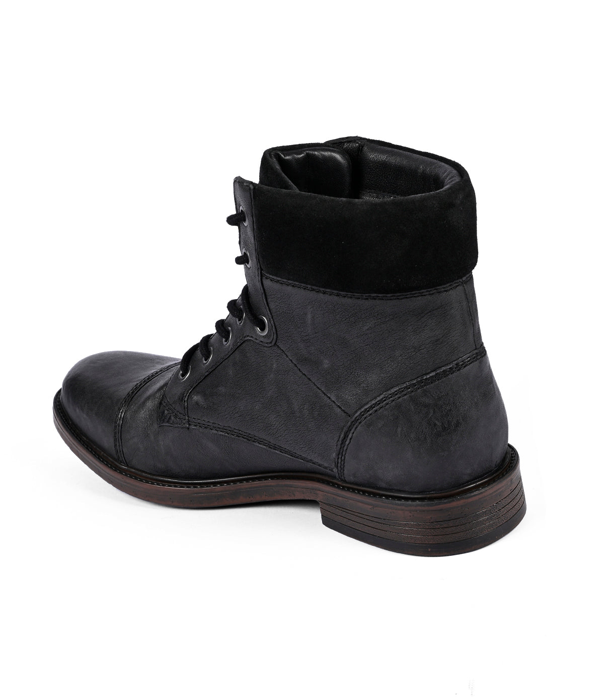 
                  
                    The Lecture by Roan is a black full-grain leather ankle boot featuring a dark sole, laces, and a padded collar. This durable men's boot is slightly angled to the left.
                  
                