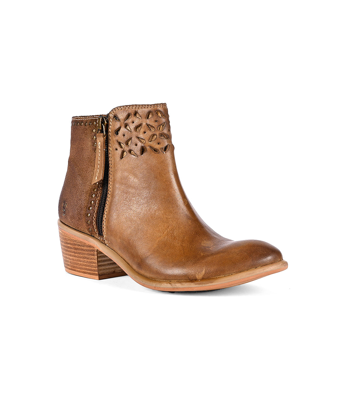 
                  
                    Roan's Liz Cutout boots showcase a brown leather ankle boot with an intricate cutout petal design on the upper, gold rivet details, a side zipper, and a wooden block heel.
                  
                