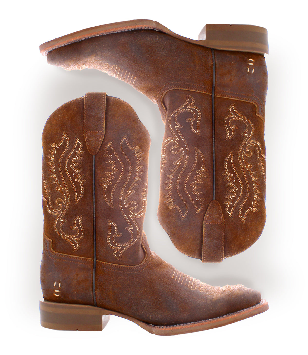 
                  
                    The Roan Saber boots are a pair of brown, western-inspired cowboy boots with decorative stitching in full-grain leather, featuring a stylish square-toed design, displayed side by side in profile.
                  
                